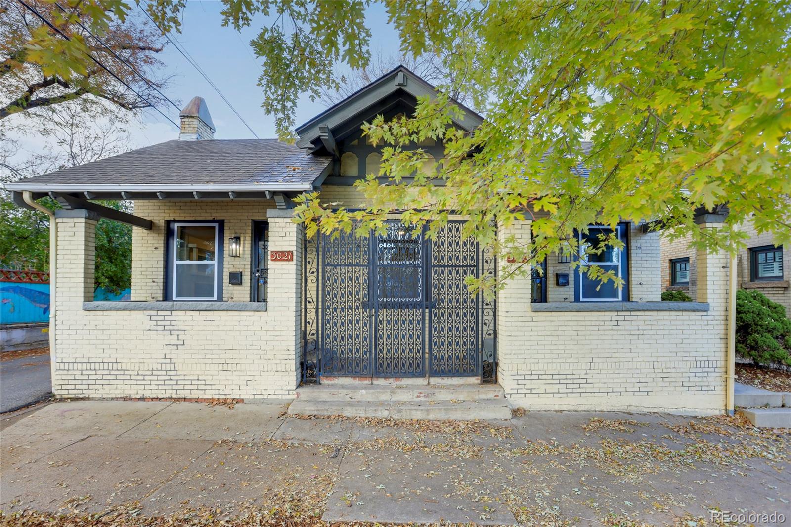 front view of a house with a street