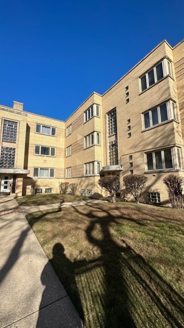 a front view of a building with balcony