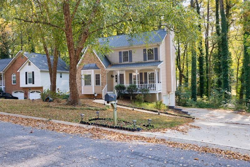 front view of a house with a small yard