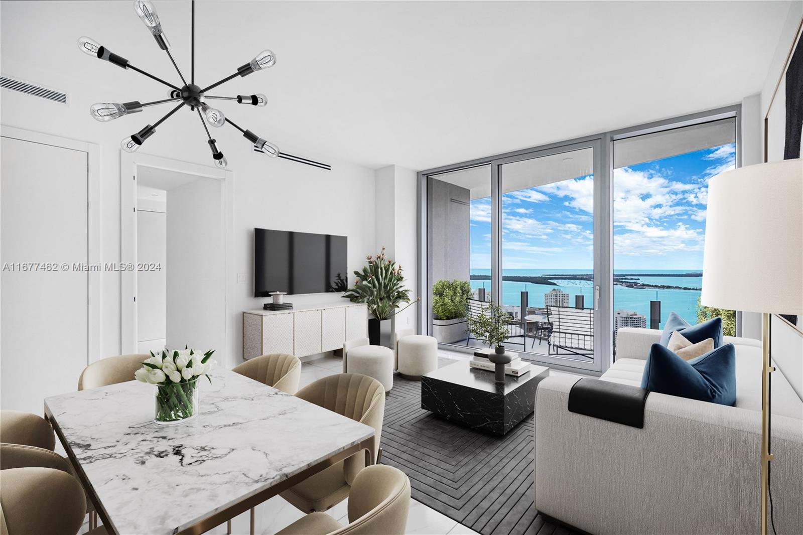 a living room with furniture a table and a large window