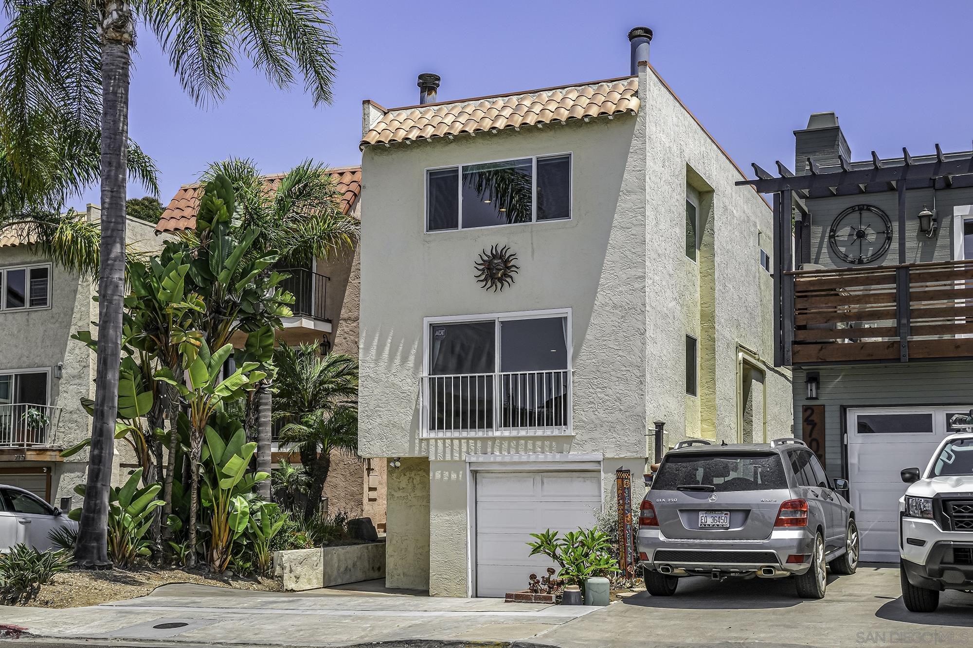 a view of a car park in front of house