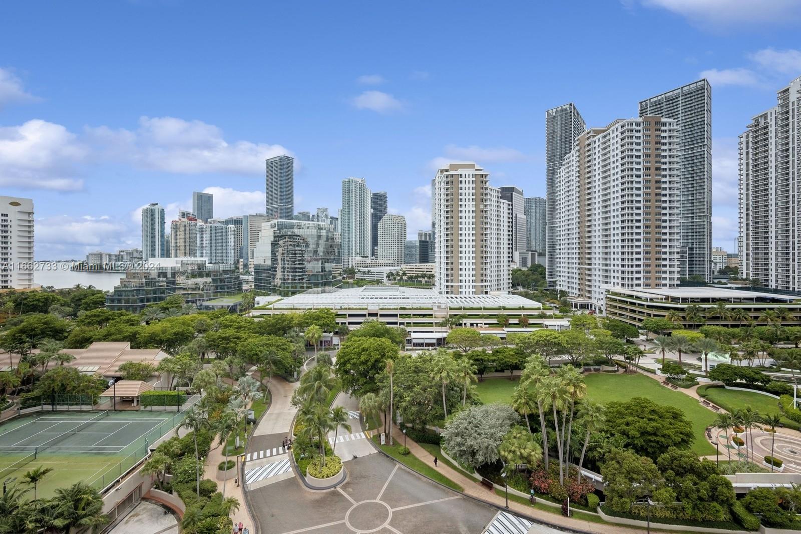 a view of a city with tall buildings