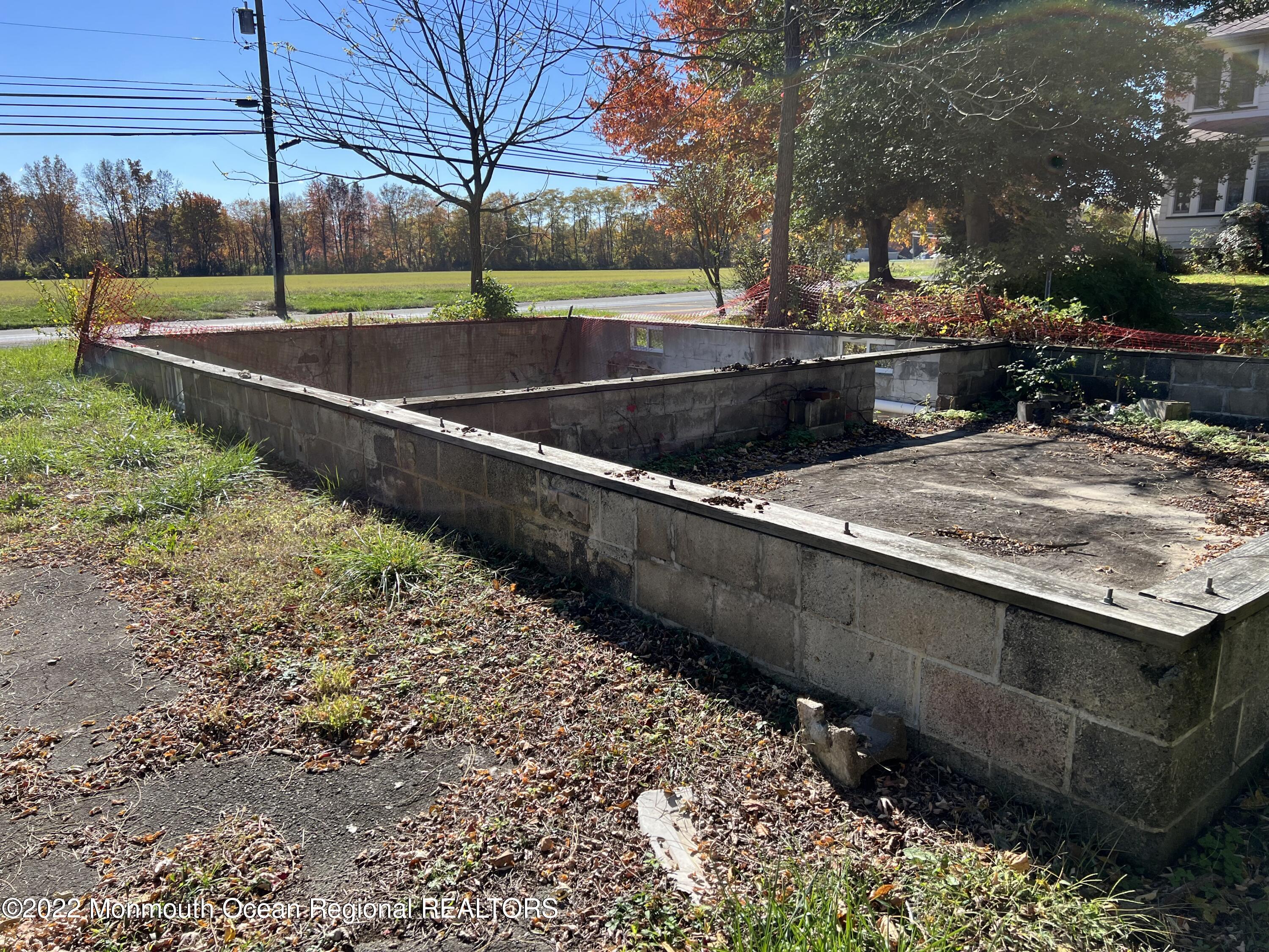 a view of a backyard with a garden