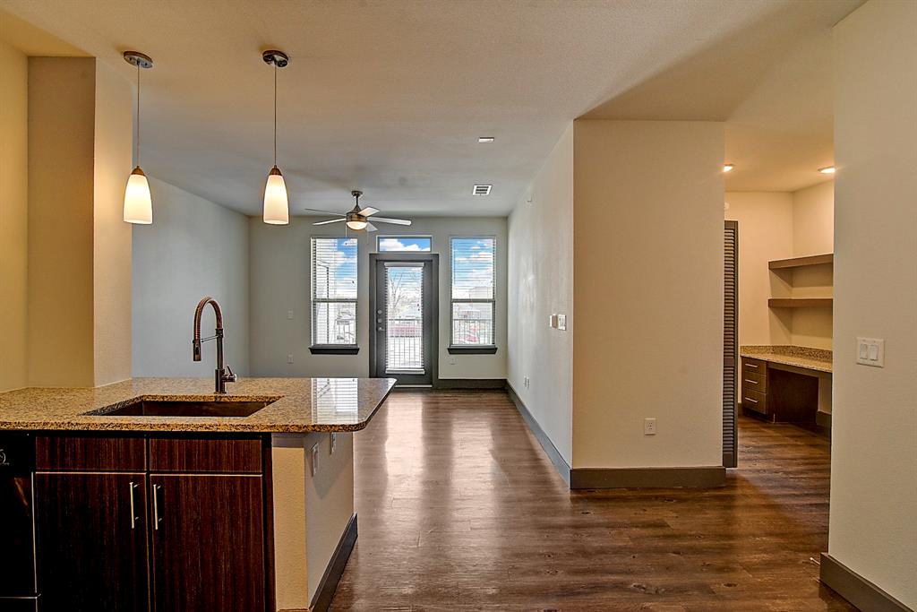 a view of a kitchen from a kitchen