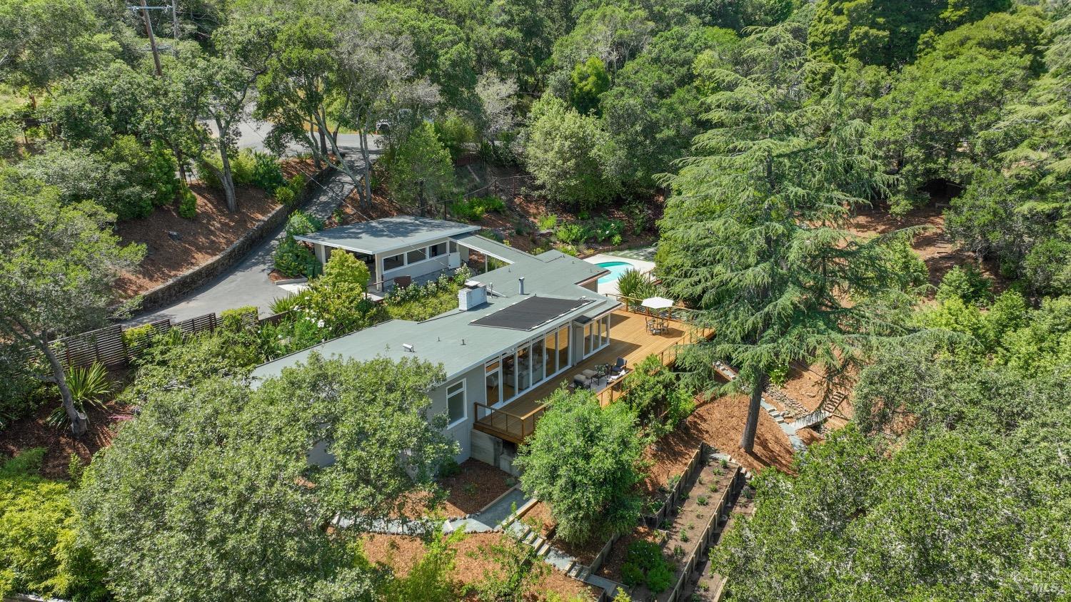 an aerial view of residential house with outdoor space