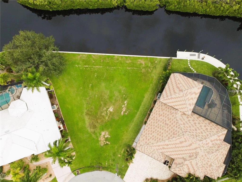 a view of swimming pool with a yard