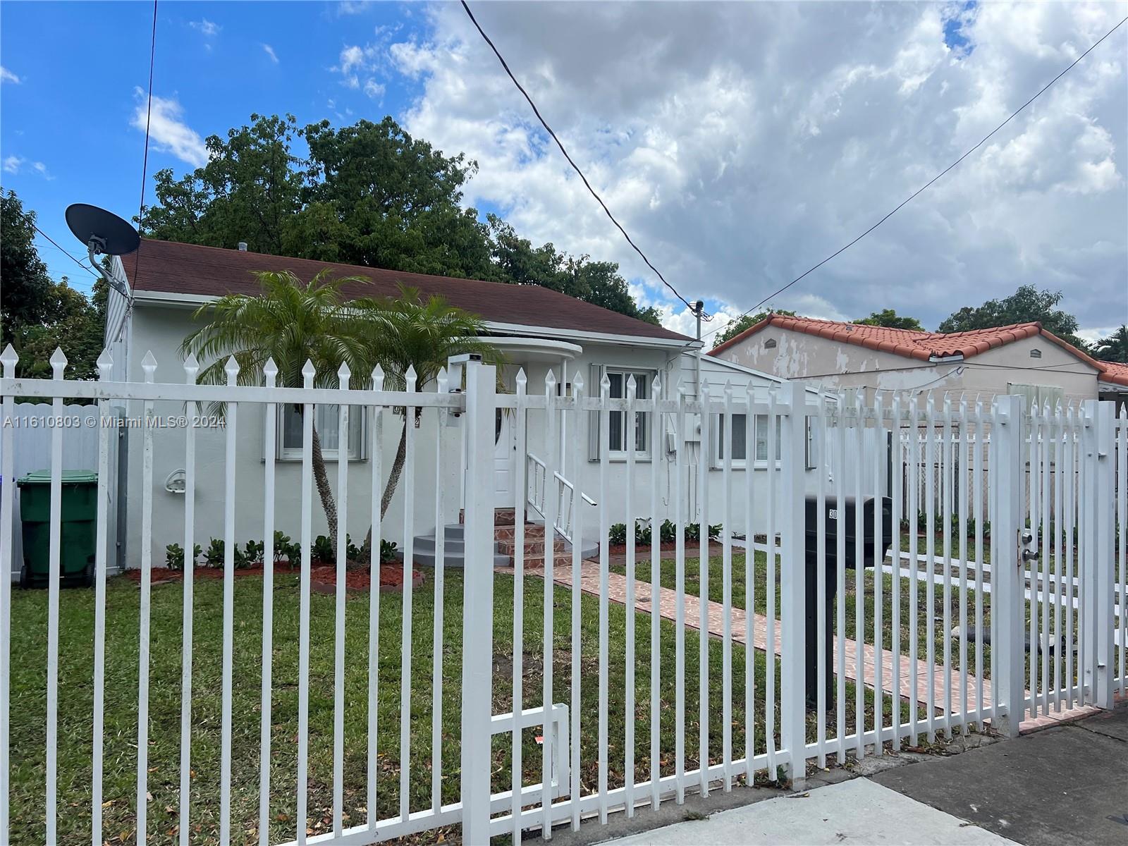 a view of a wooden fence