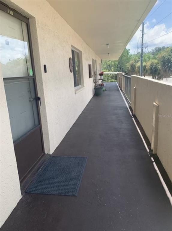 a view of a hallway with window