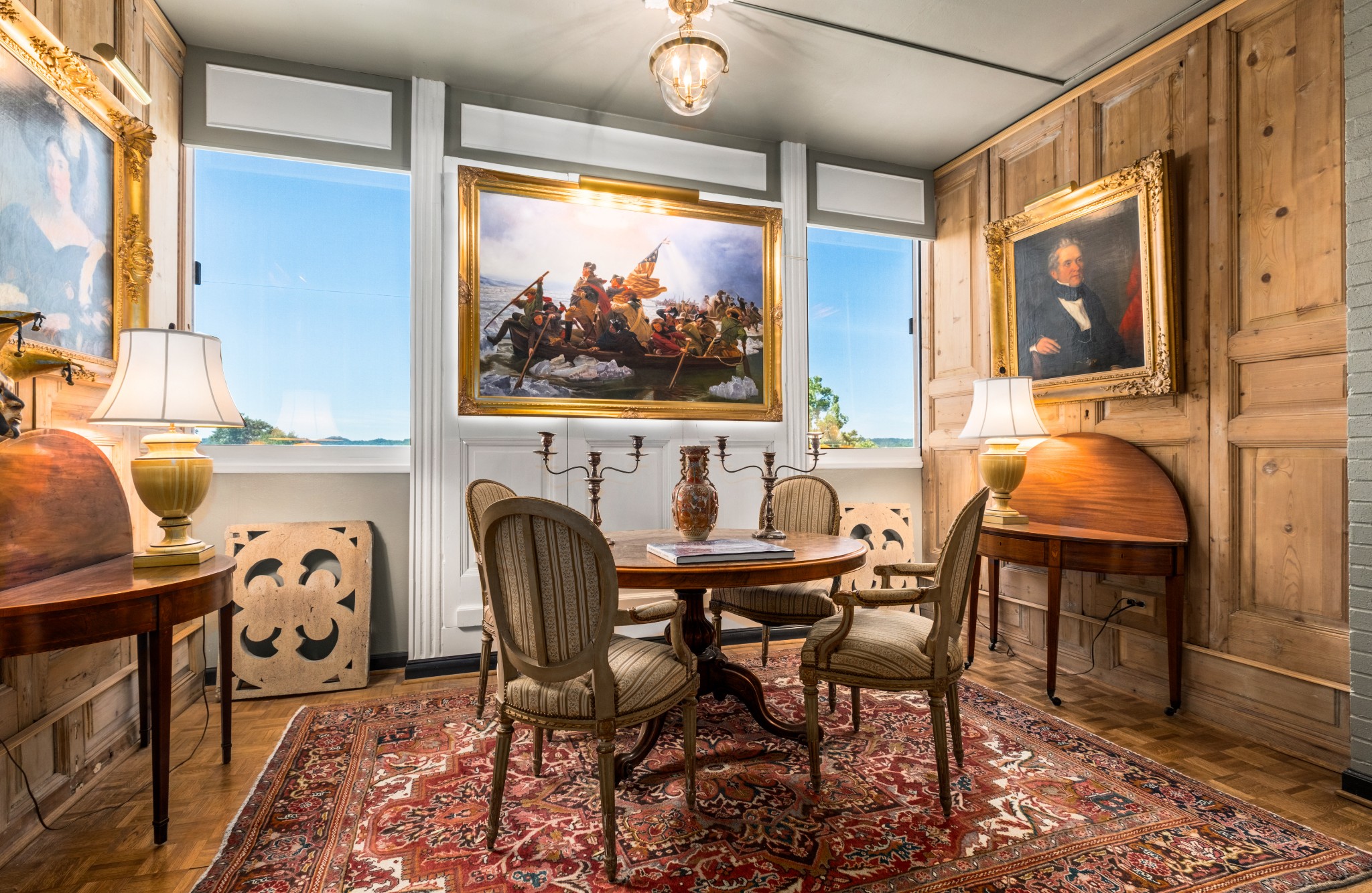 a dining room with furniture and window