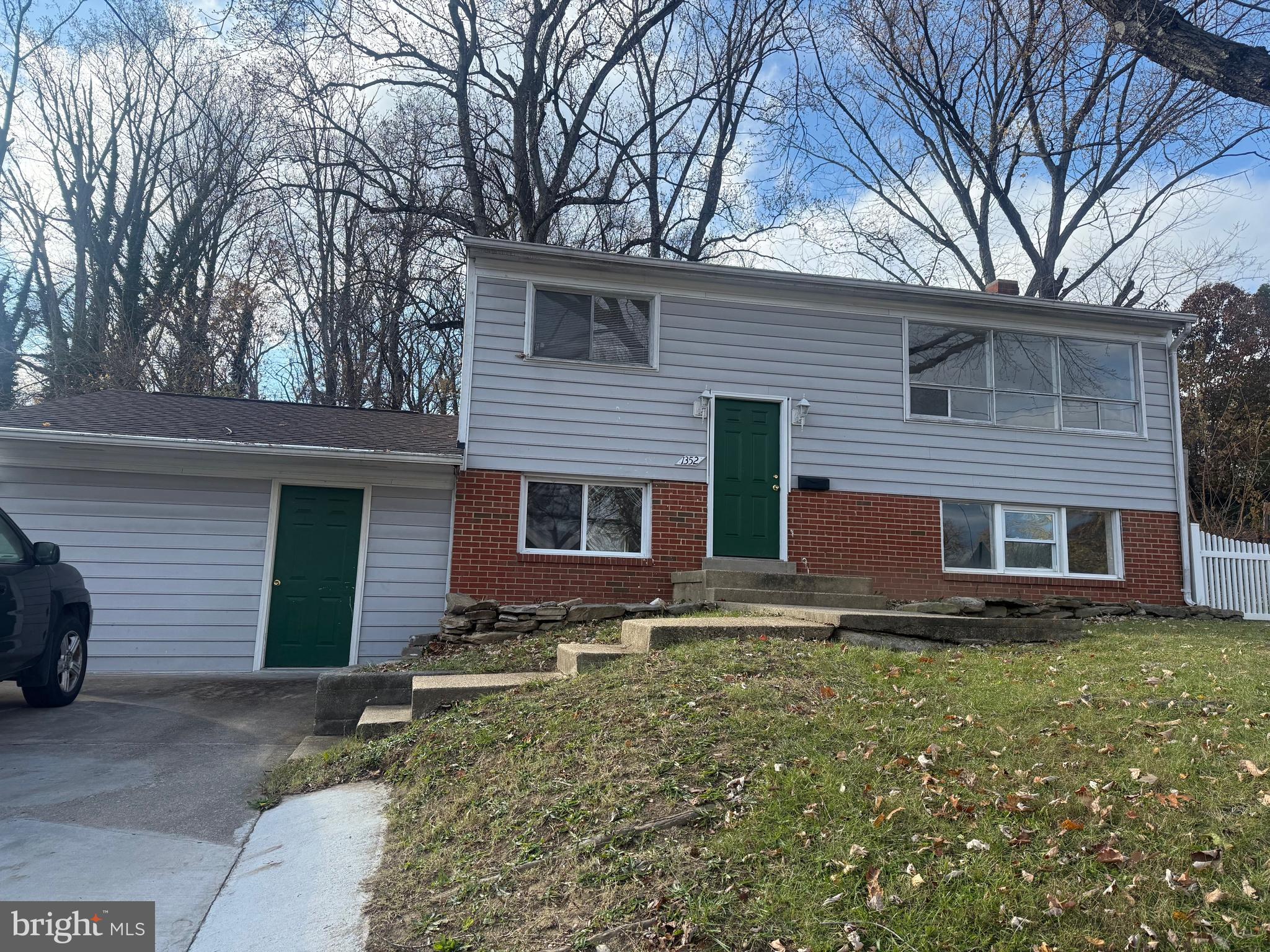 a front view of house with yard