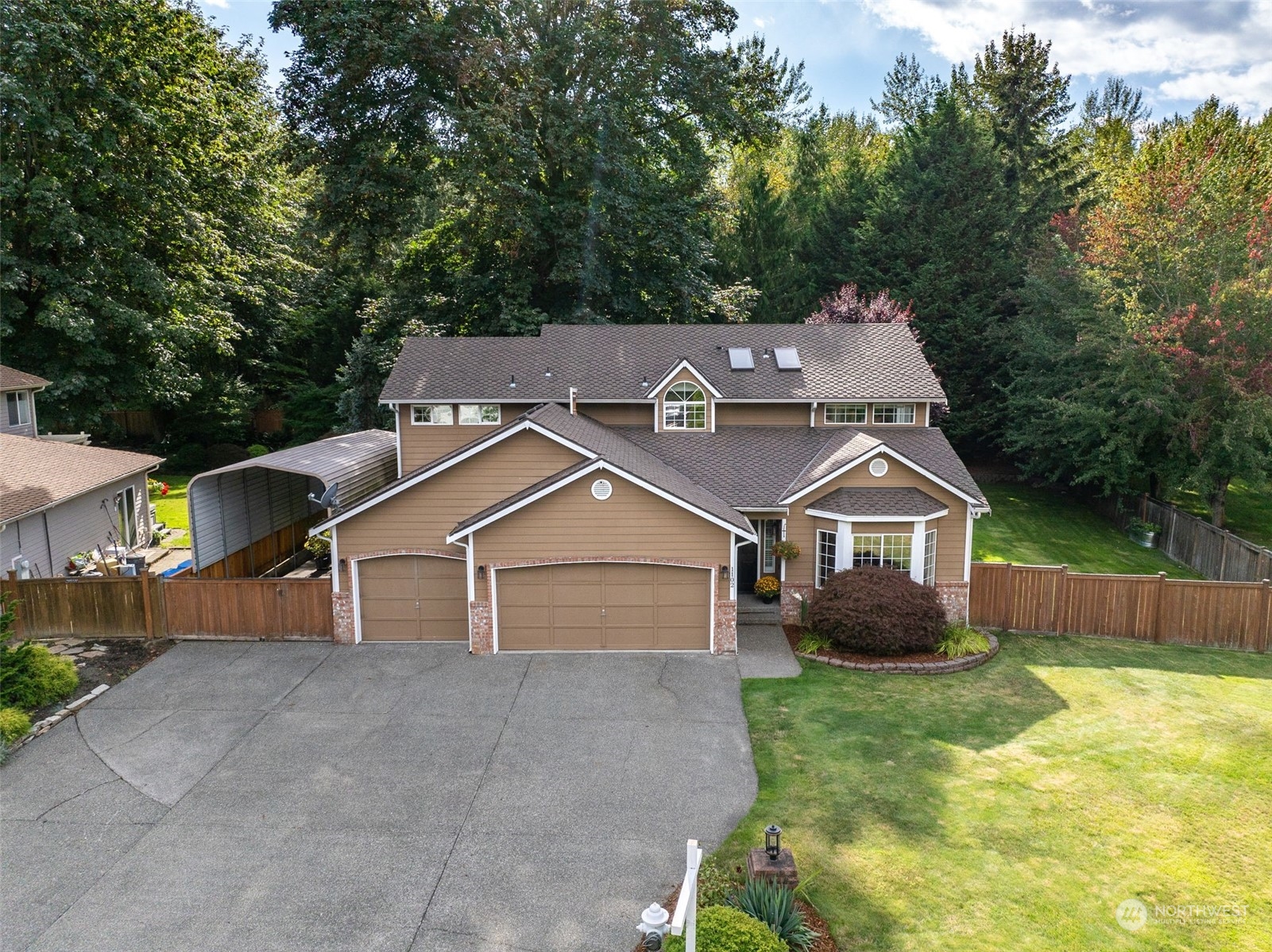 front view of a house with a yard