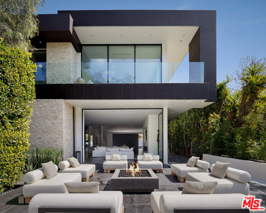 a building outdoor space with patio furniture