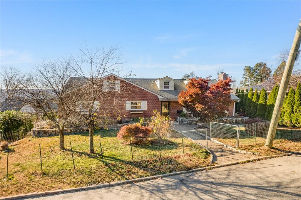 View of front of home with a front yard