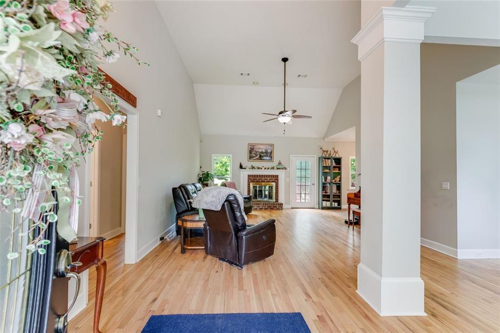 a view of a dining room with furniture window and wooden floor