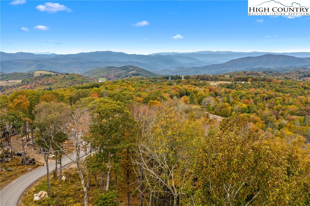 a view of mountains and valleys