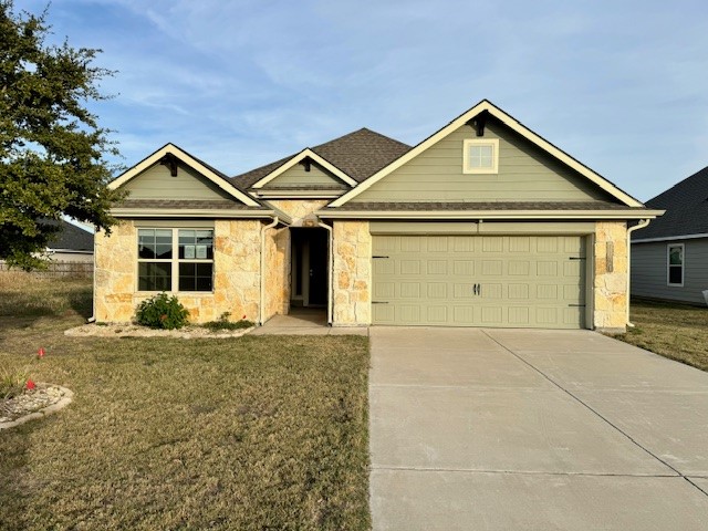 a front view of a house with yard