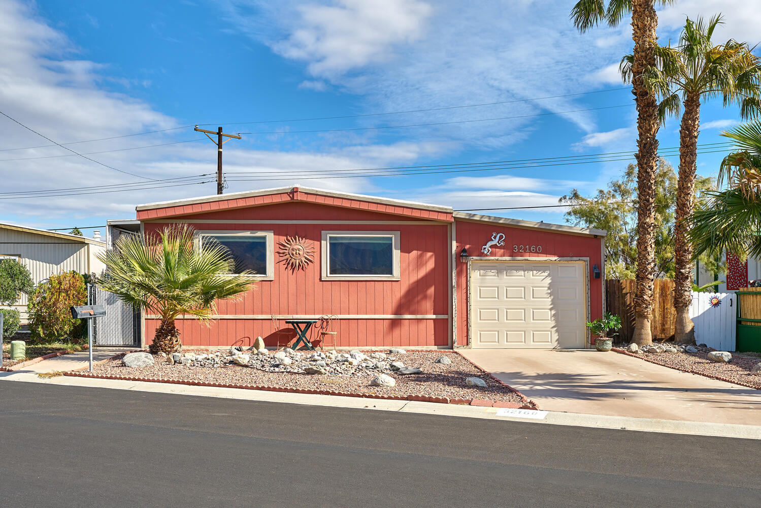 a front view of a house with a garage