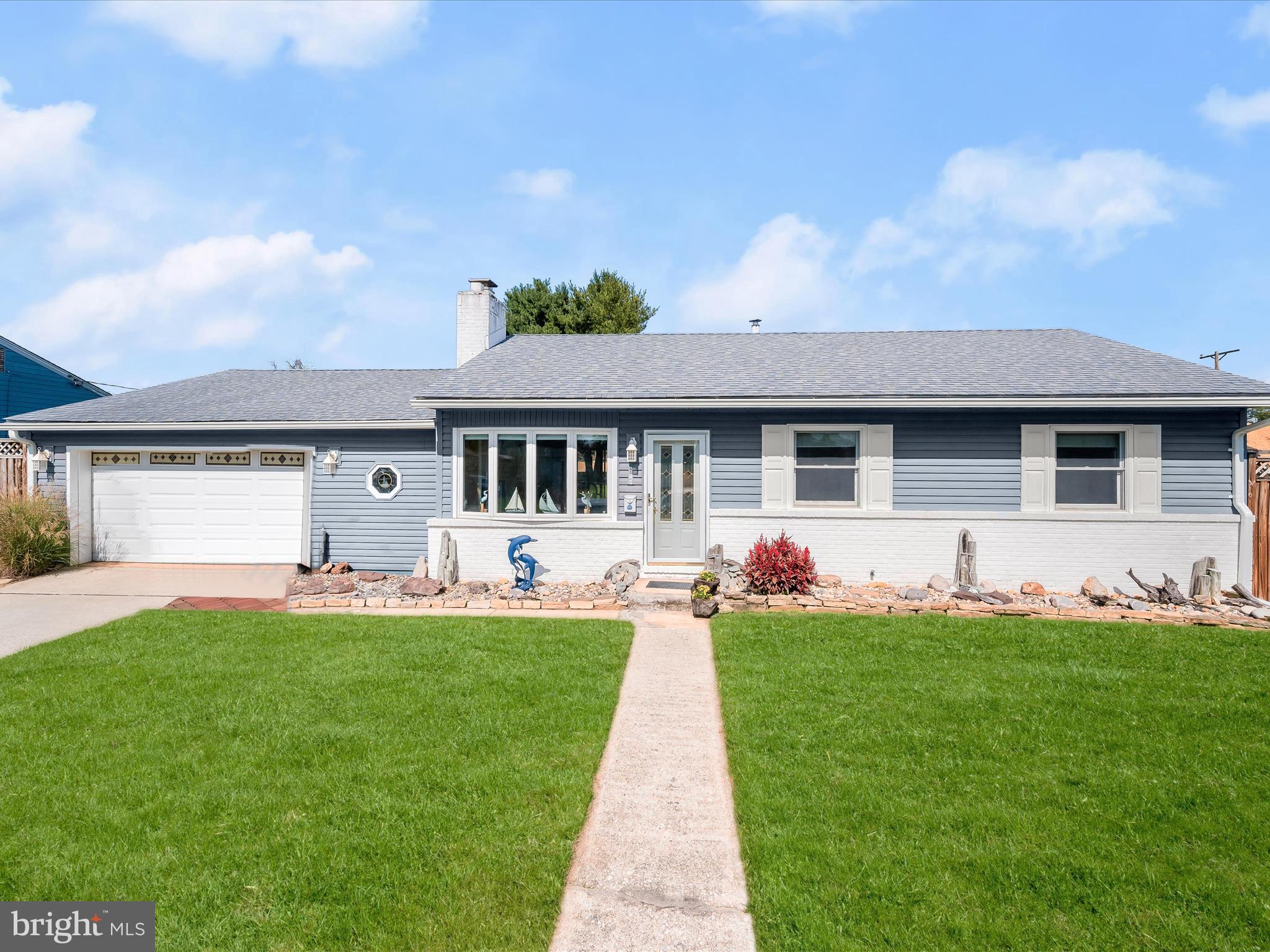 a front view of house with yard