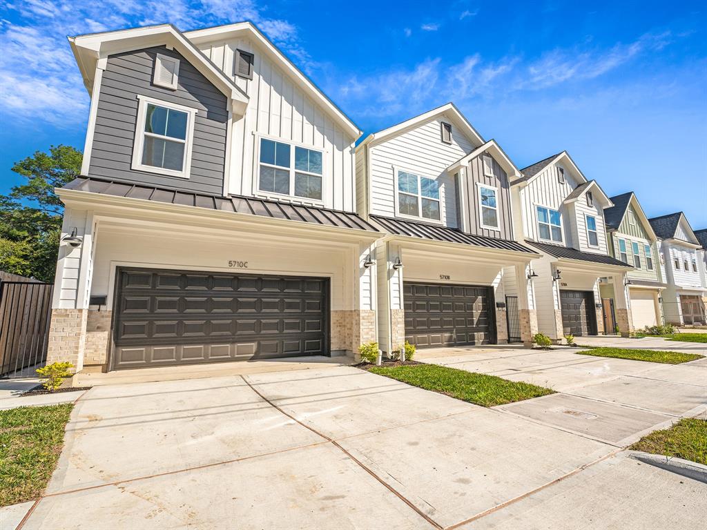 a front view of a house with a garage