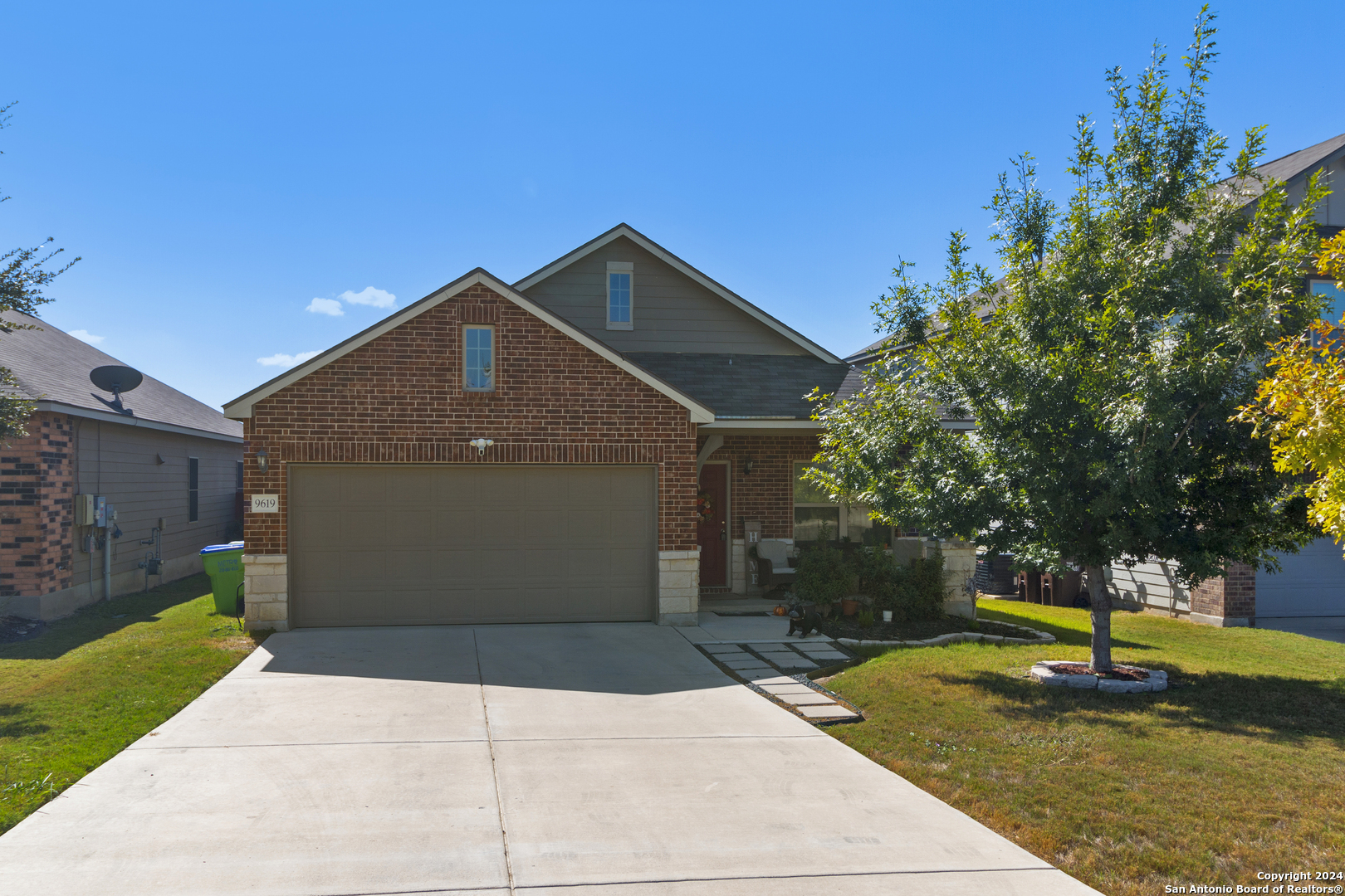 a front view of a house with swimming pool