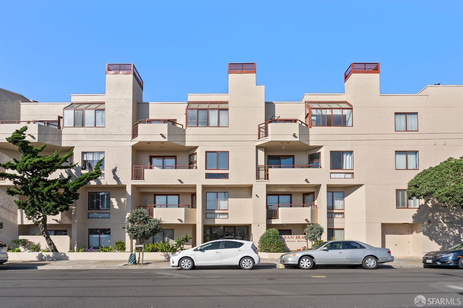 a front view of a building with street view