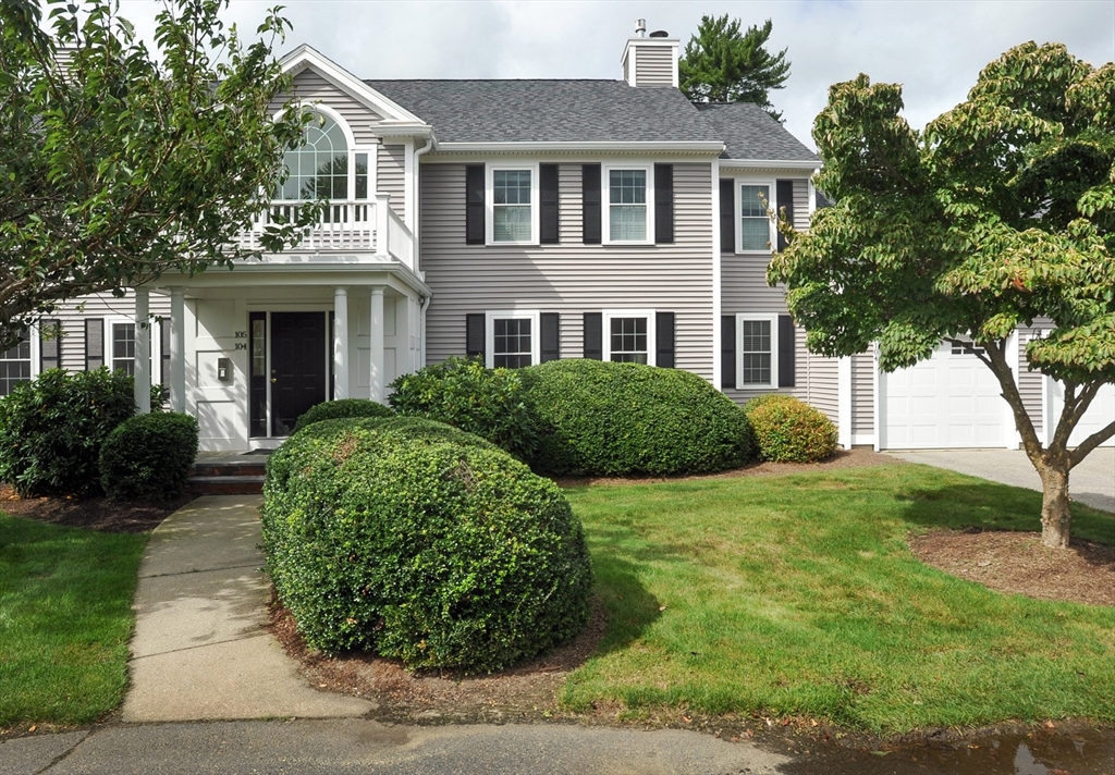 a view of a house with a garden