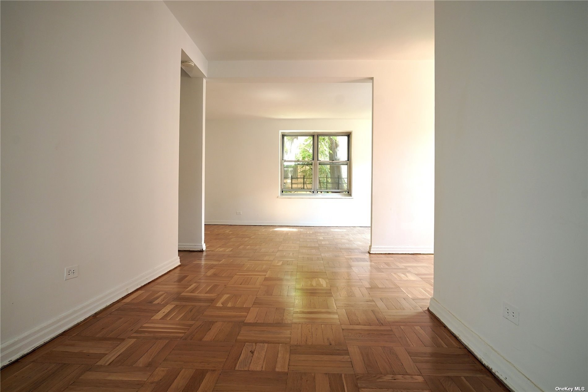 a view of an empty room and window