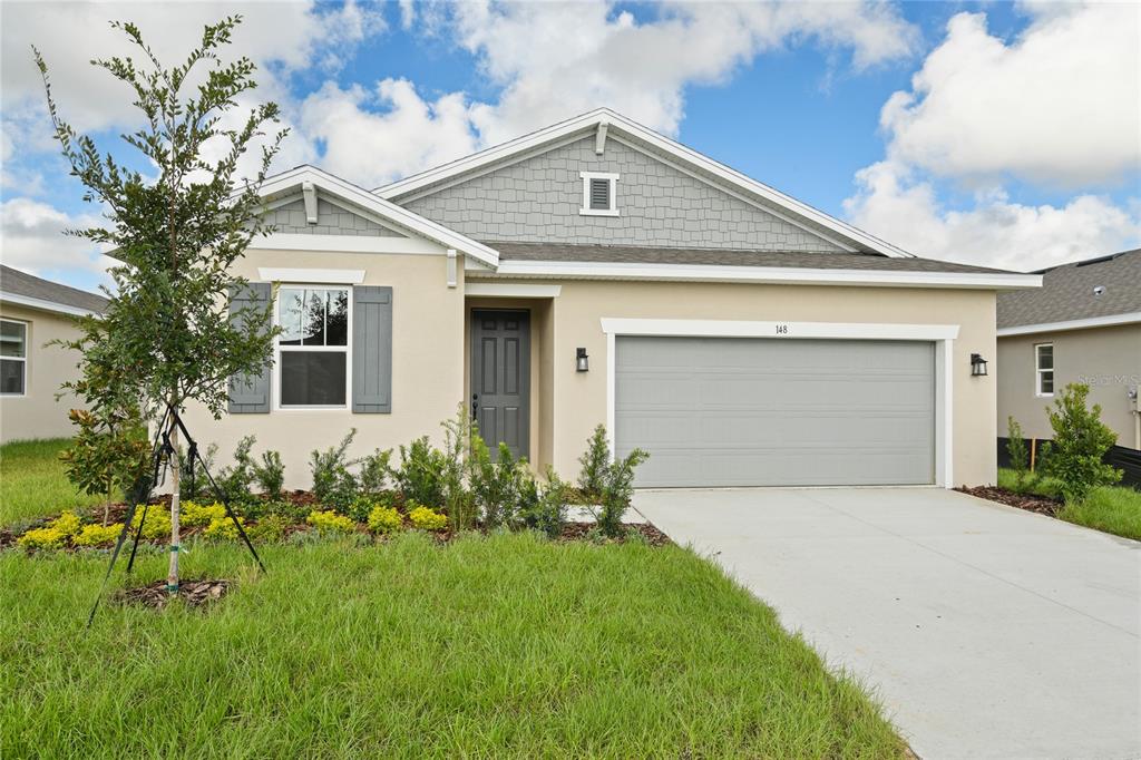 a front view of house with yard