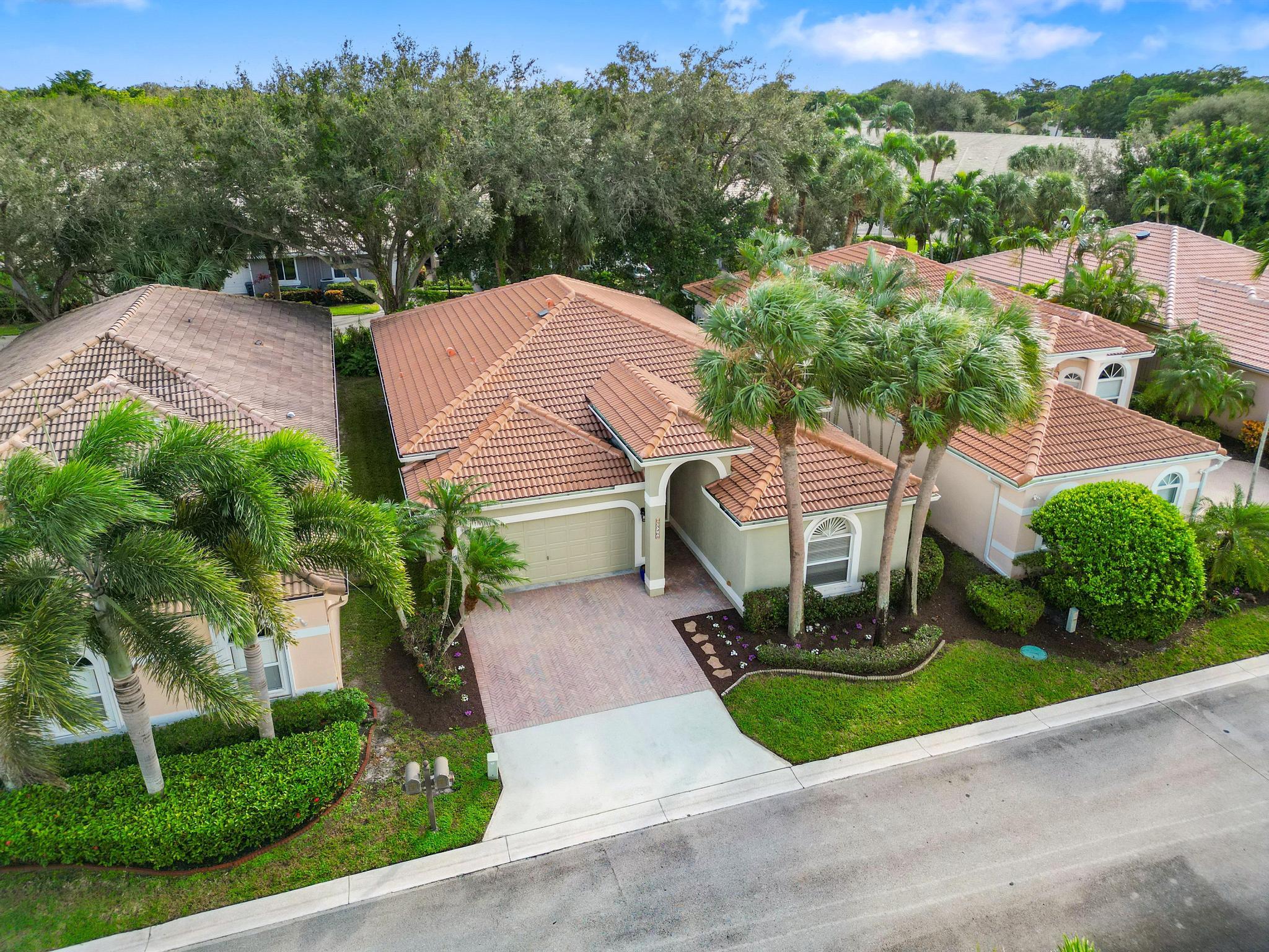 an aerial view of a house with a garden