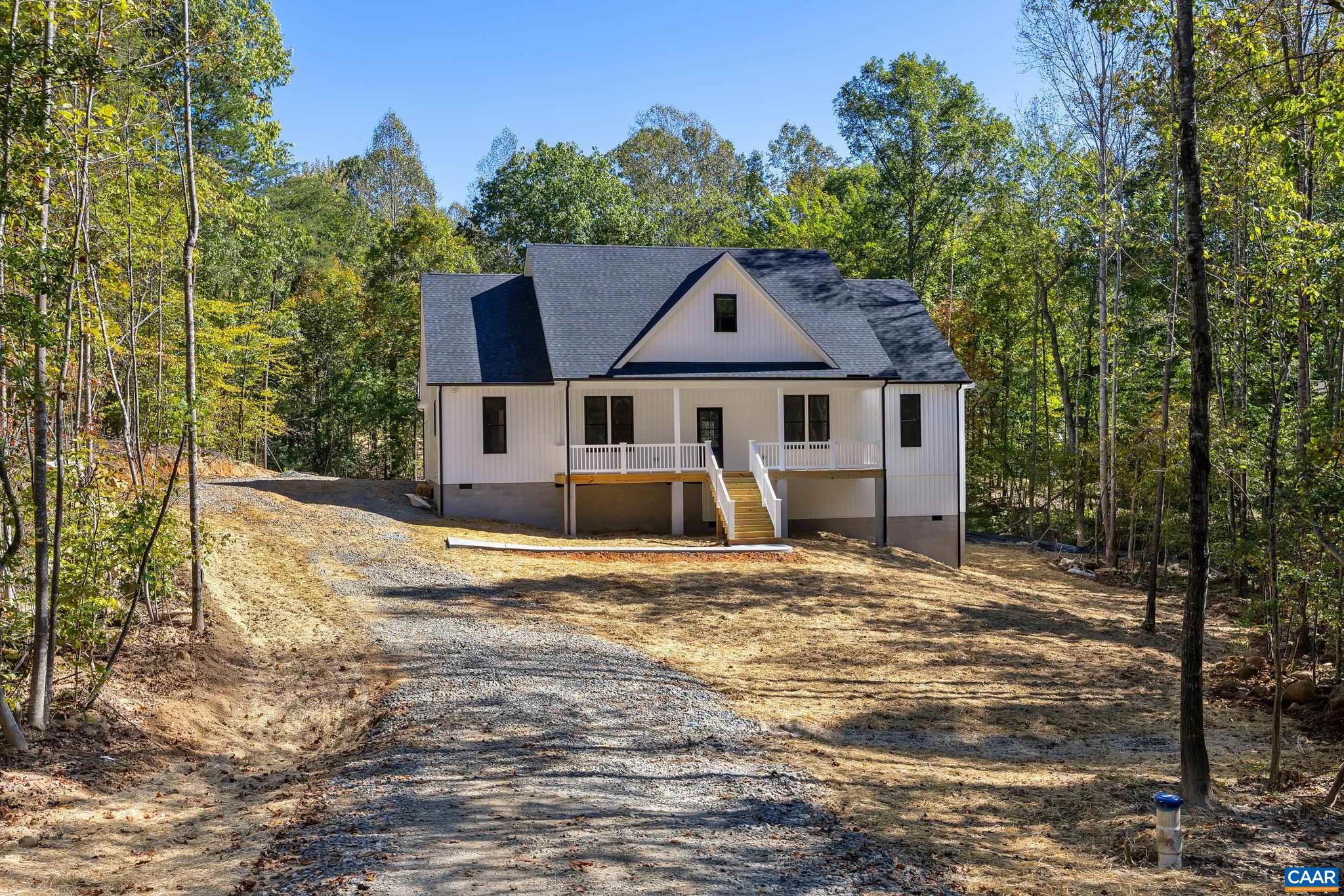 a house with trees in the background