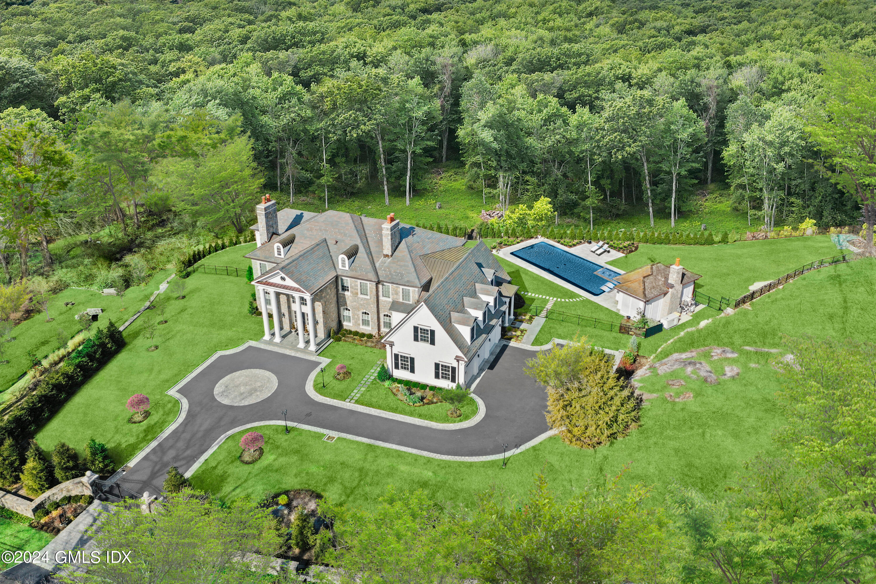 an aerial view of a house with garden