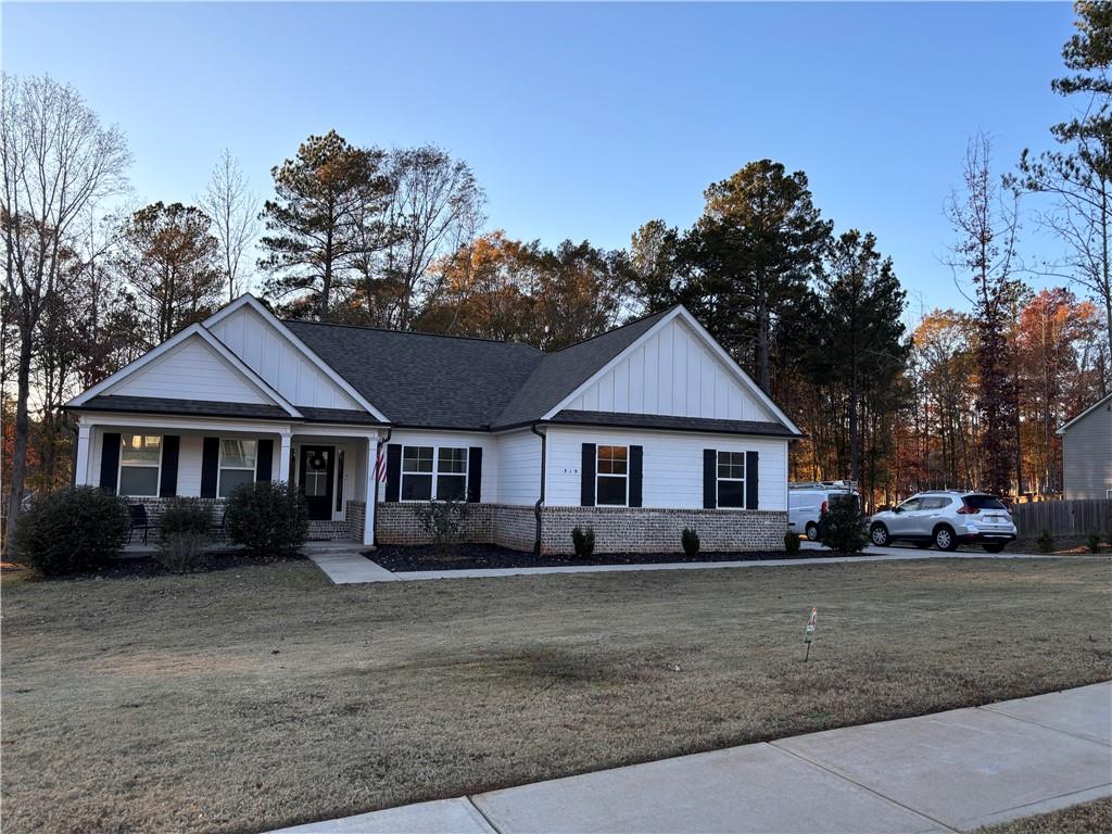 front view of a house with a yard