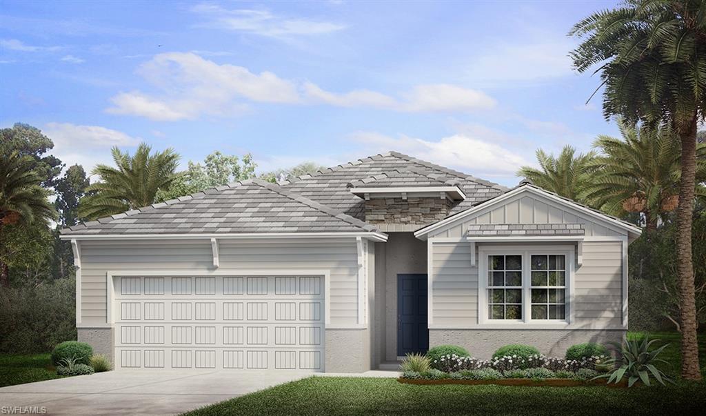 View of front facade featuring a garage