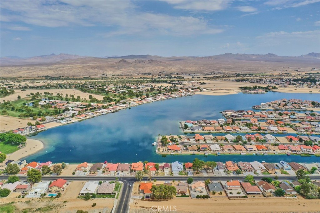 a view of a city with a lake