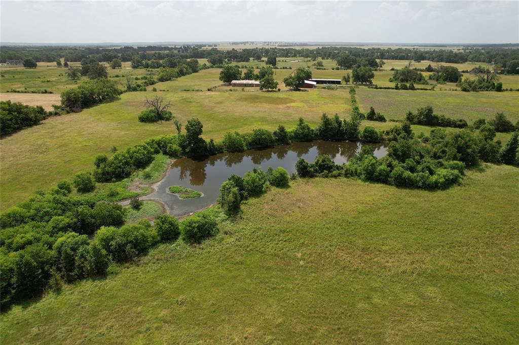 a view of a lake with houses in outdoor space