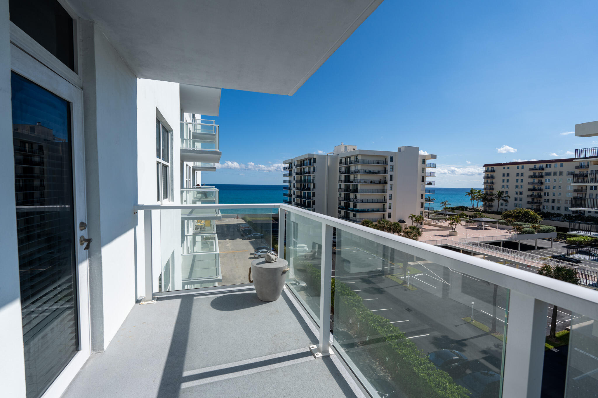 a view of balcony with furniture