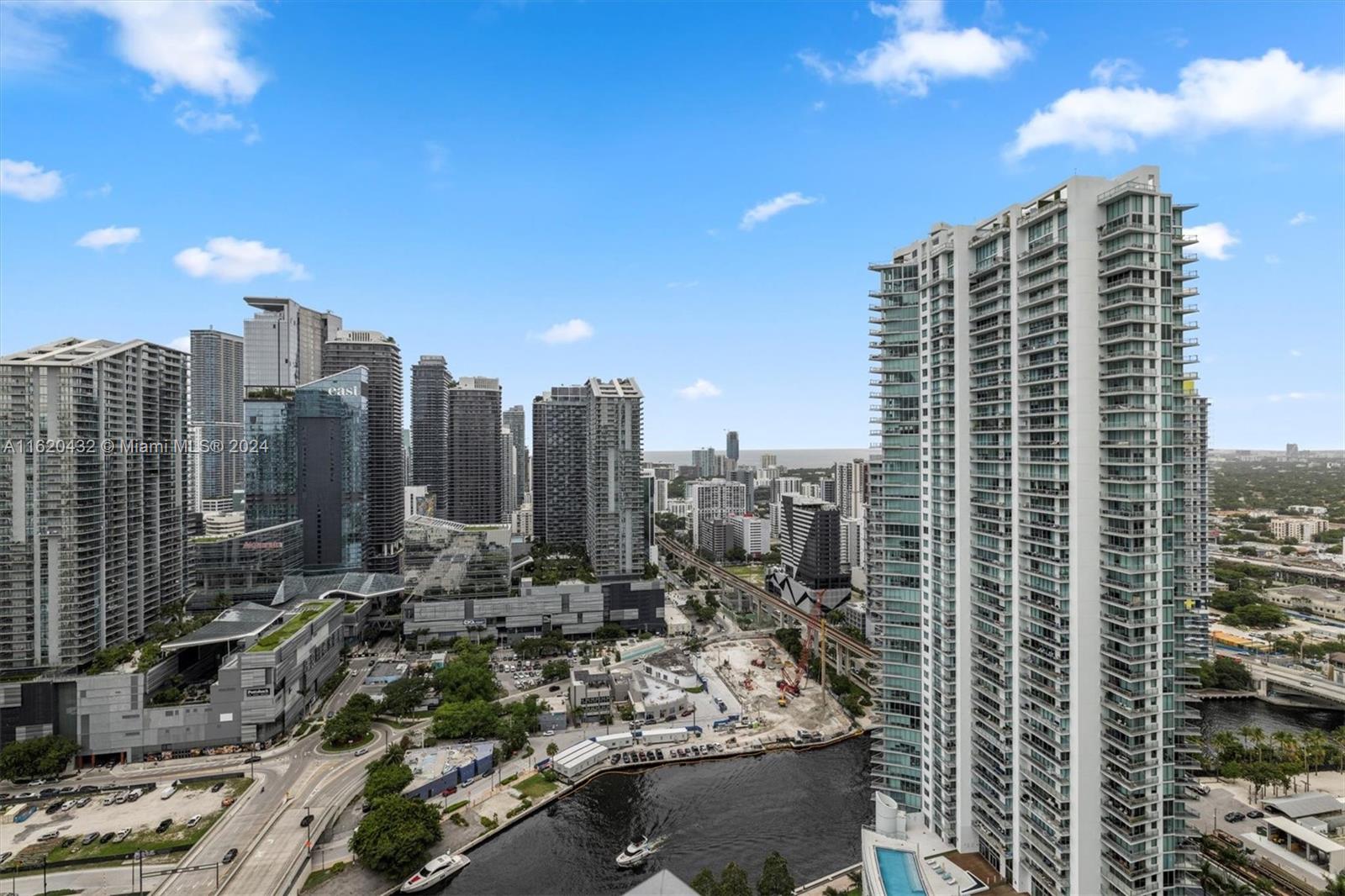 a view of a city with tall buildings