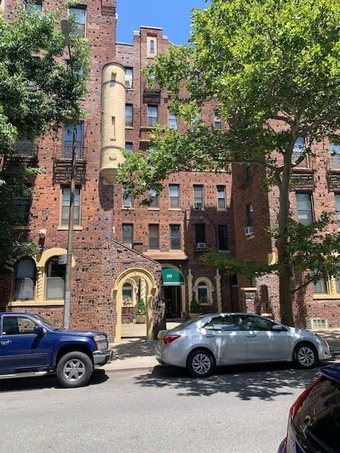 a car parked in front of a building