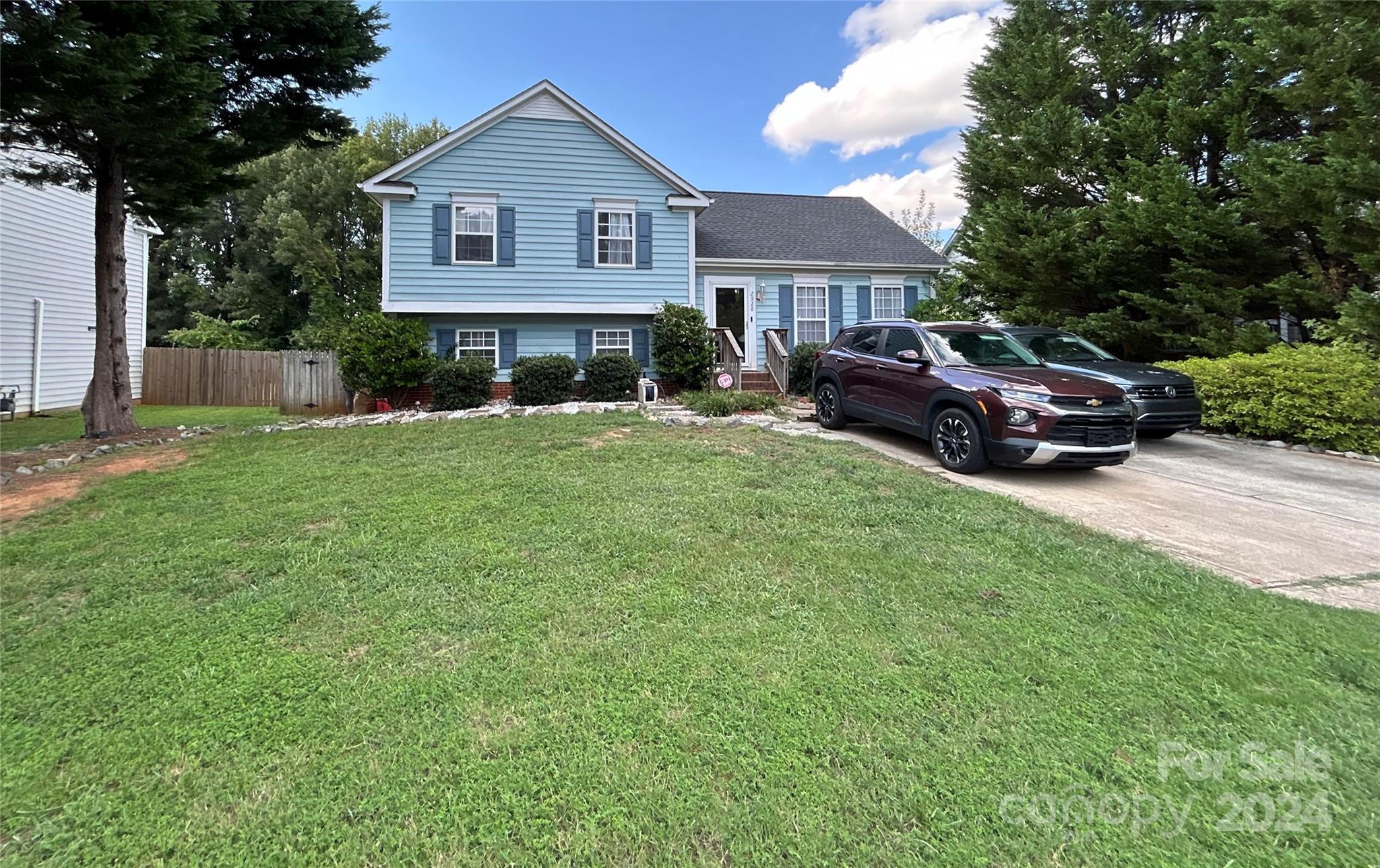 a house view with a garden space