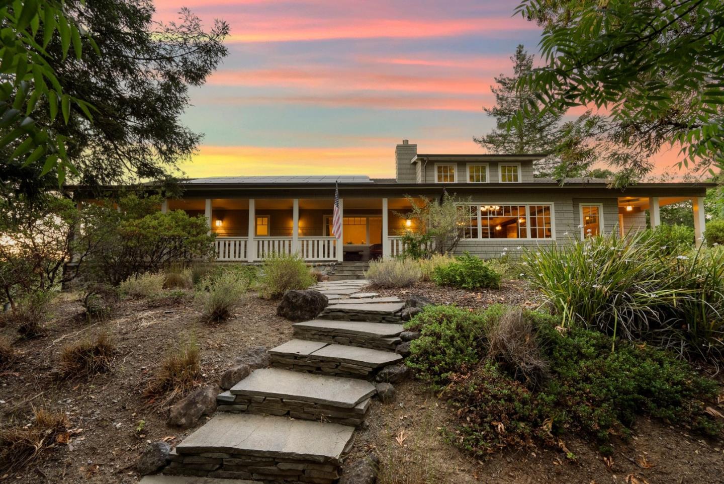 front view of a house with a yard