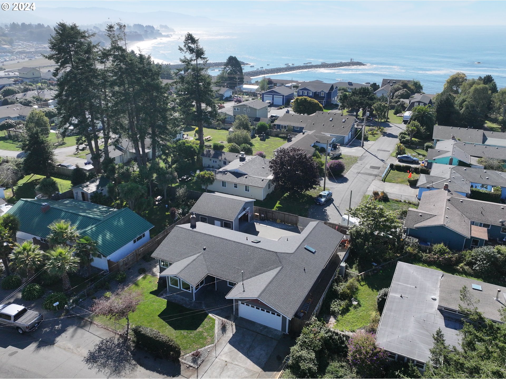 an aerial view of a house with a garden