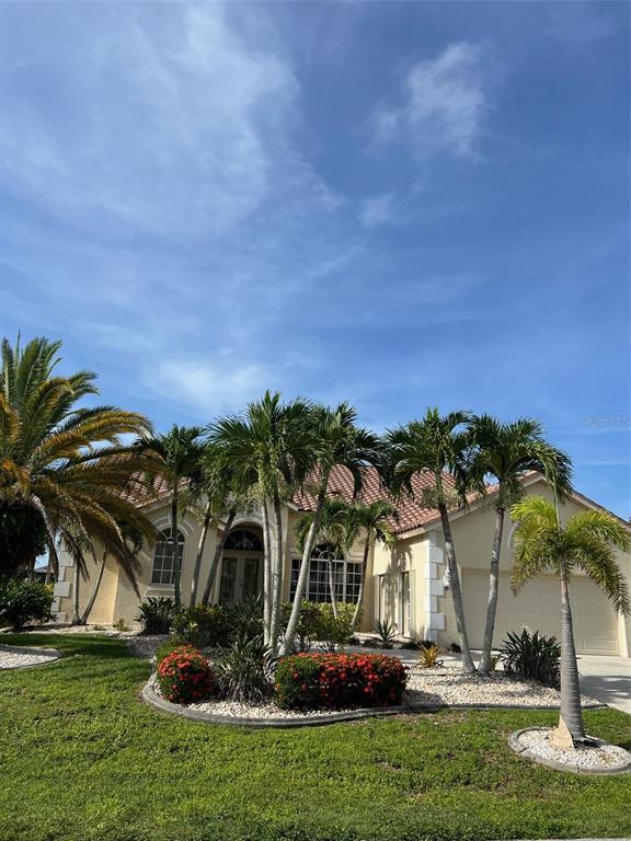 a front view of multi story residential apartment building with yard