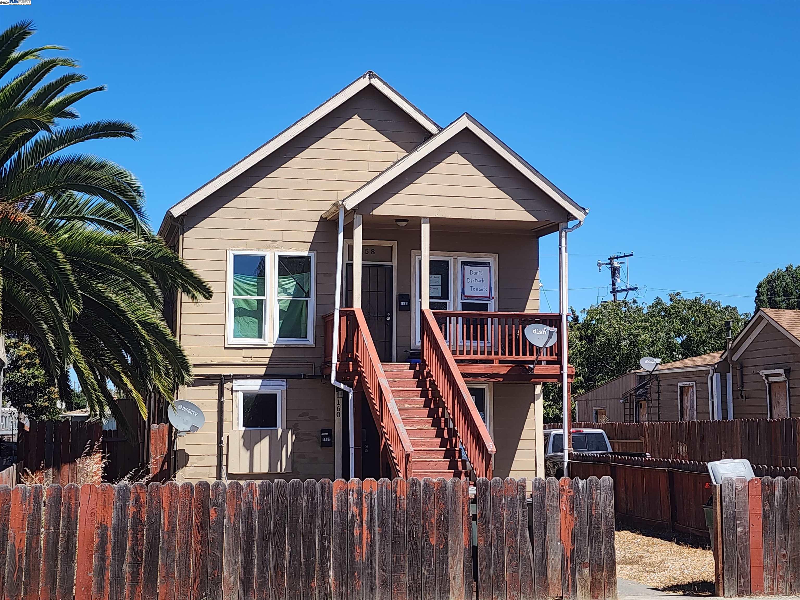 a front view of a house with yard