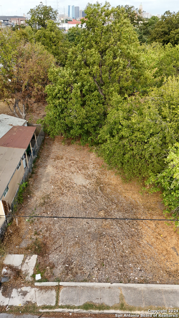 a view of a yard with an outdoor space