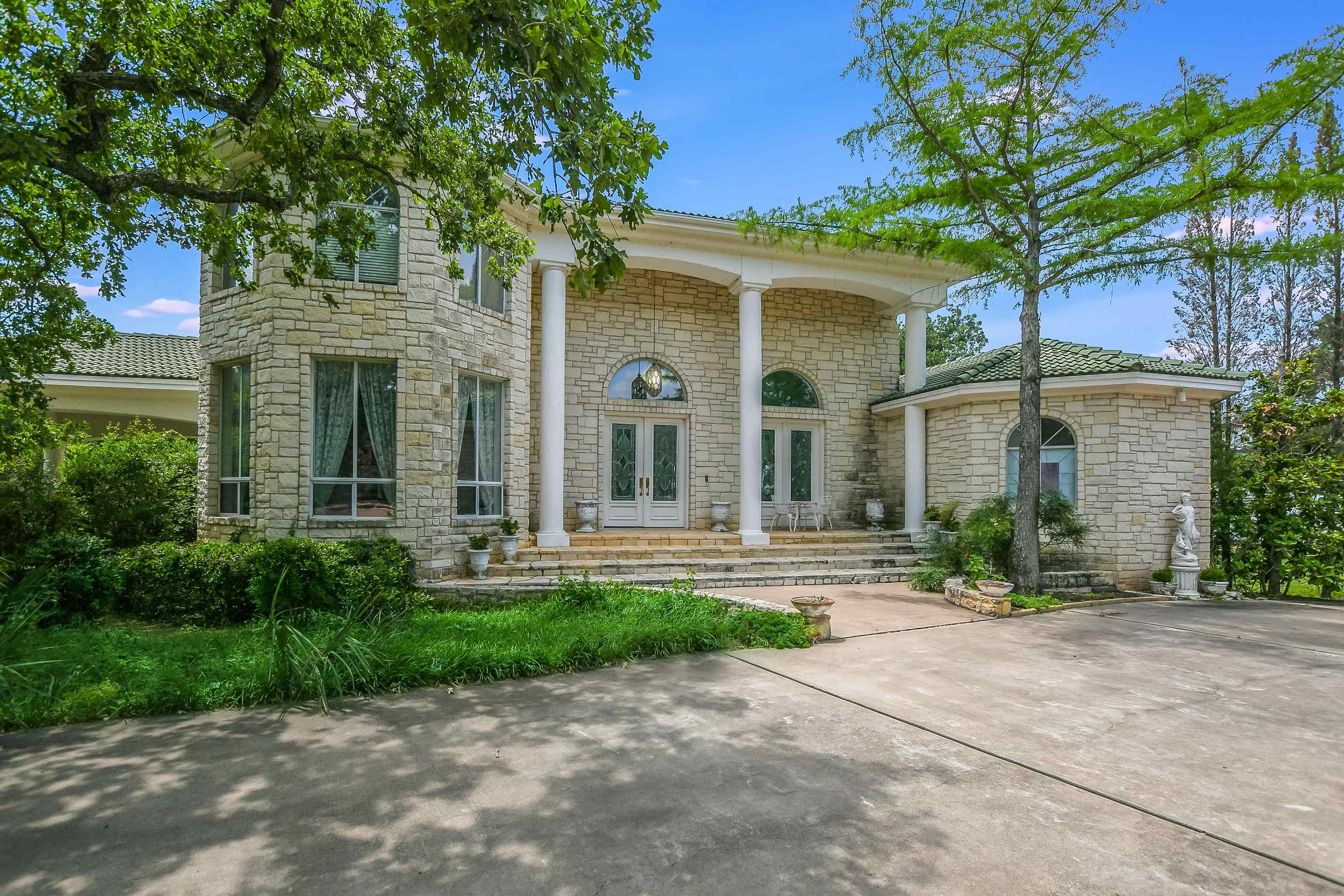 front view of a house with a small yard