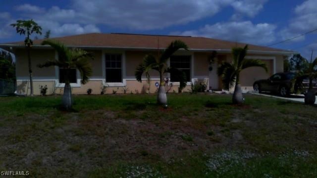 a view of a building with a garden