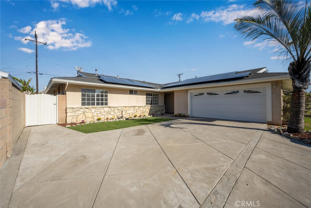 This turnkey 4-bedroom 2 bath West Garden Grove home really delivers!