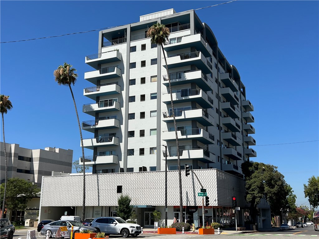 a front view of a building with street view