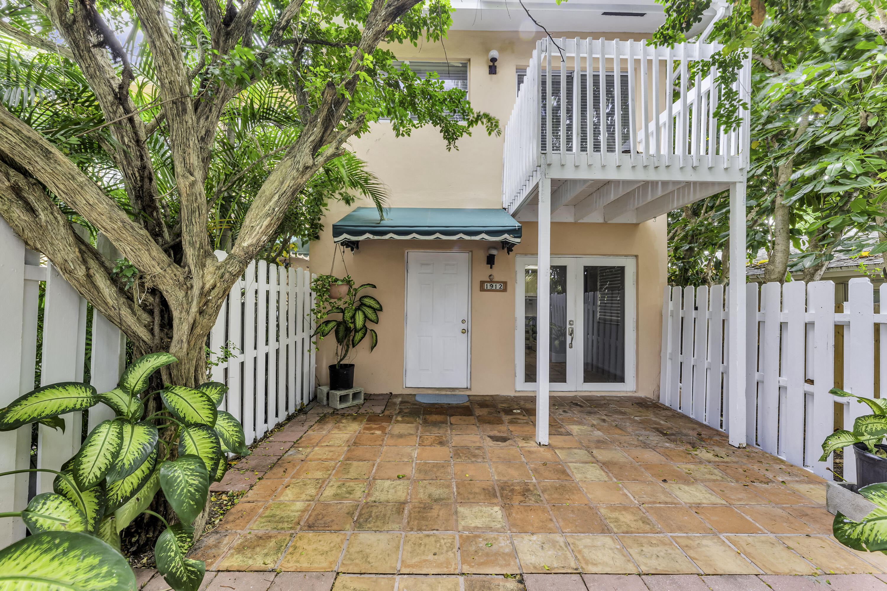 a front view of a house with a porch