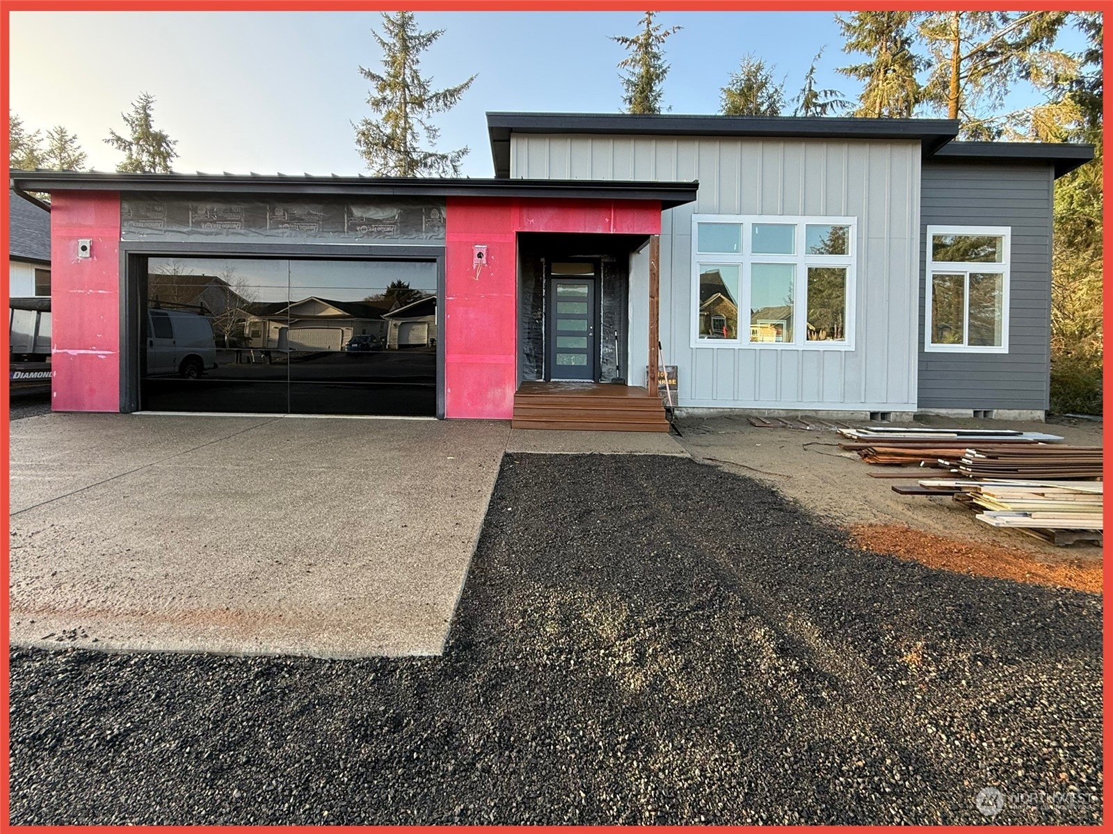 a front view of a house with parking